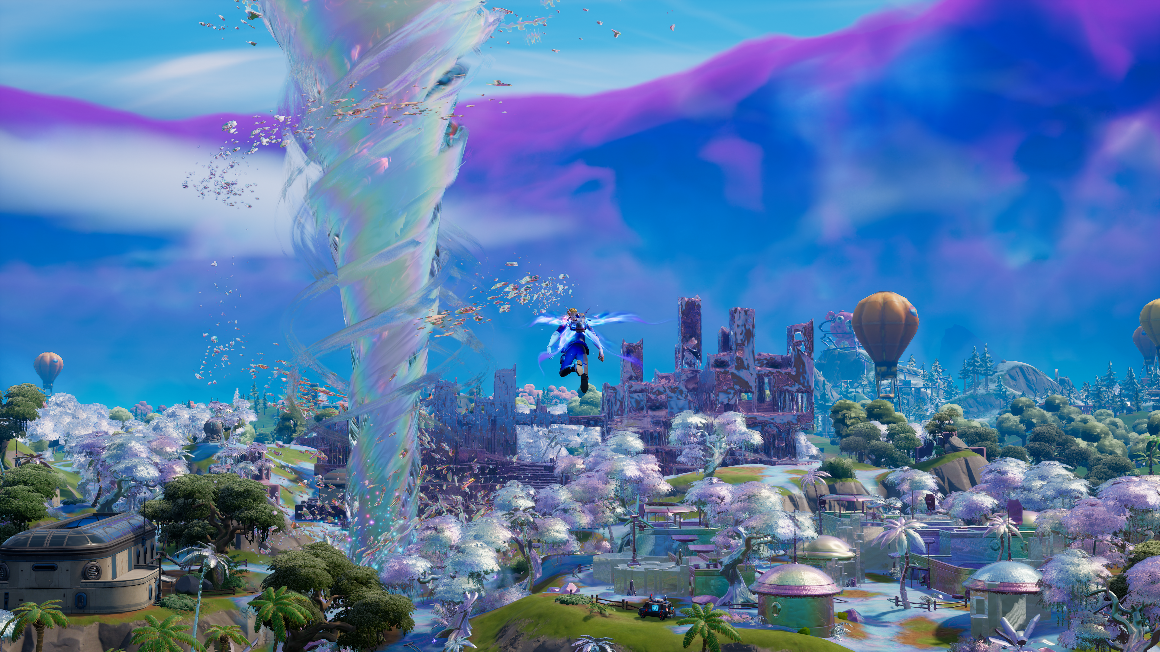 Fortnite Chapitre 3 Saison 4 Île Une capture d'écran de la peau de l'agent Jonesy survolant l'île de Fortnite Chapter 3 Season 4, avec une tornade chromée au centre.