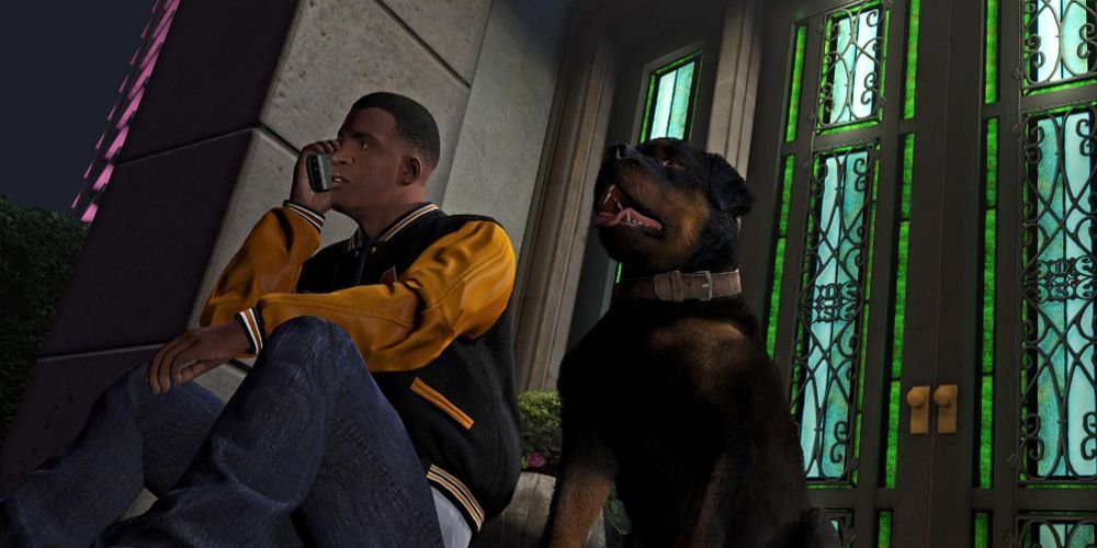 Franklin et Chop sont assis sur un perron dans GTA V