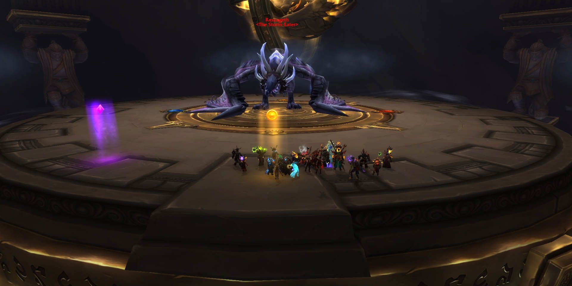 World of Warcraft - une équipe de raid face à un grand dragon bleu