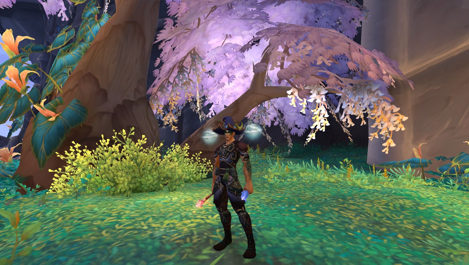 Un évocateur habillé en enchanteur avec des épaulettes enchantées dans World of Warcraft.