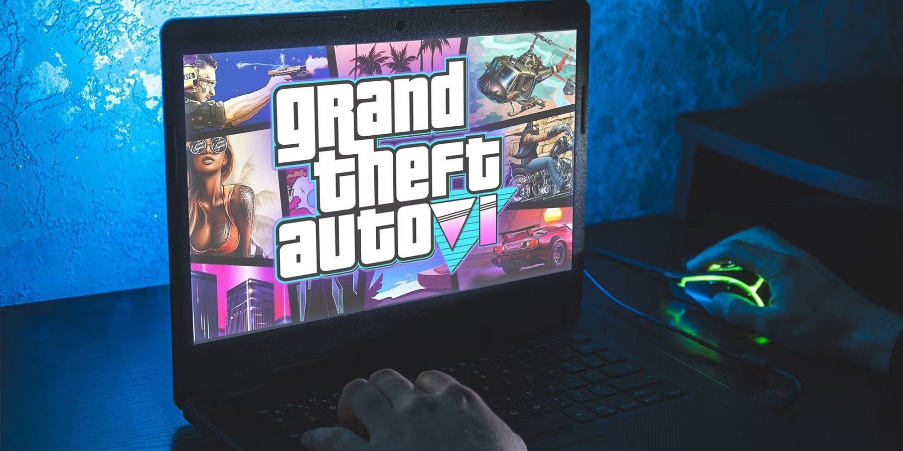 Photo d'un ordinateur portable avec une image de style Grand Theft Auto 6 sur l'écran.