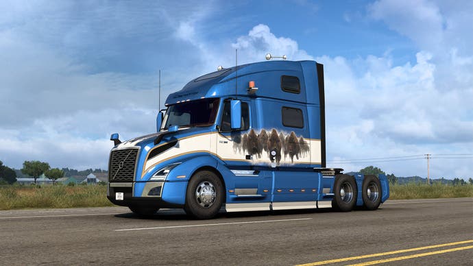 A truck emblazoned with the Wild Stampede paint job, featuring a group of illustrated horses stampeding head-on.