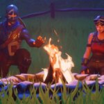 Où trouver des feux de camp dans Fortnite Fortnite Campfire With Multiple People Near It In A Field