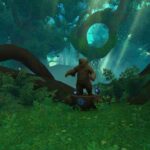 Découvrez comment ouvrir le trésor de la Statue du Seigneur de l'Ours à WoW Dragonflight Statue of the Bear Lord standing in the woods