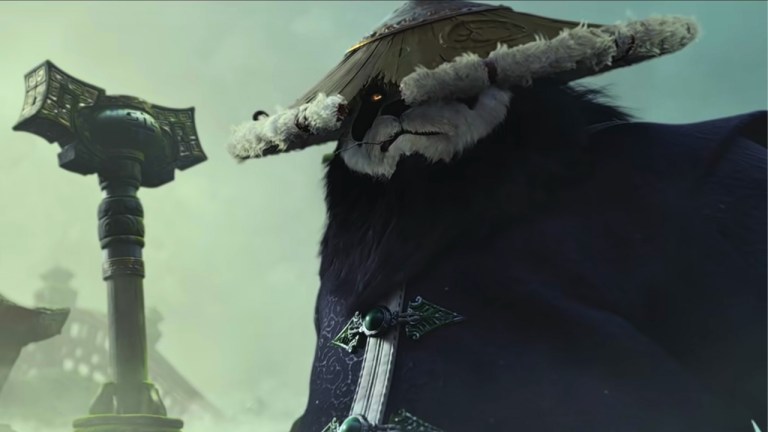 A pandaren male holding a staff in WoW Mists of pandaria