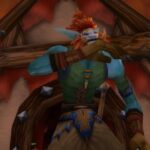 Shaman Troll standing in front of Den