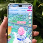 pokemon go on a smartphone with a gym on the screen