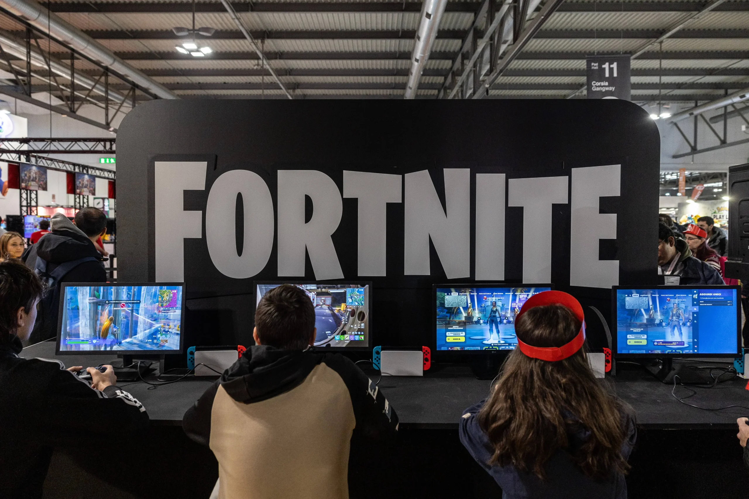 MILAN, ITALY - NOVEMBER 22: Fairgoers play video games at the Japanese publisher Nintendo Switch's stand during Milan Games Week & Cartoomics 2024 at Fiera Milano Rho on November 22, 2024 in Milan, Italy. Milan Games Week is the most important video games festival in Italy, featuring the latest news of gaming industry, the most exciting esports tournaments and amazing digital entertainment moments. (Photo by Emanuele Cremaschi/Getty Images)